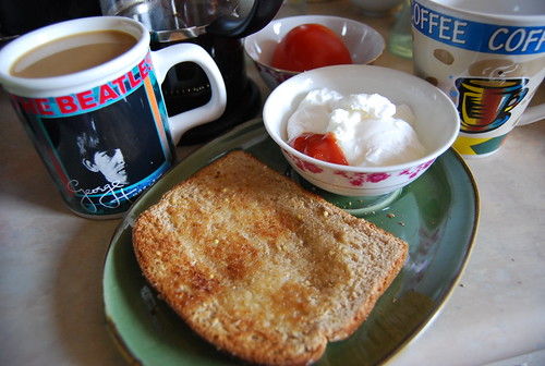 Poached eggs and toast with coffee