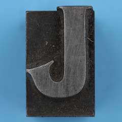 metal type letter J