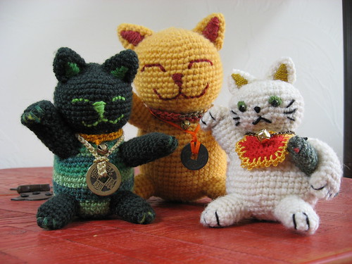 Three Crocheted Maneki Neko Cats