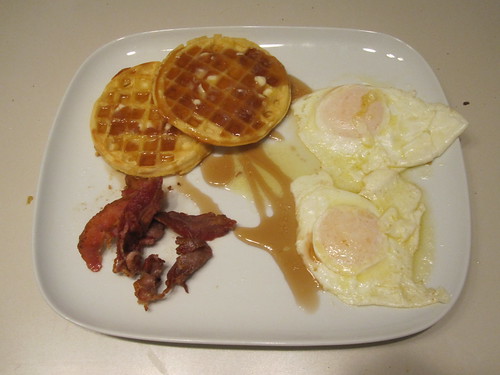 waffles, eggs, bacon, maple syrup