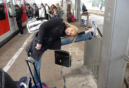 Extra cooling down can be done anywhere - Christina Chitwood at an Obserstdorf, Germany, train station.