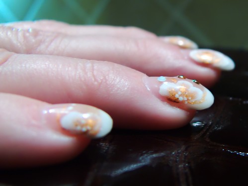 White flower on oval french nails