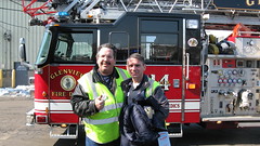 First Transit paratransit drivers Eddie K and his friend Mike posing by a Glenview Fire Department ladder truck. Glenview Illinois. Saturday, March 6th 2010.