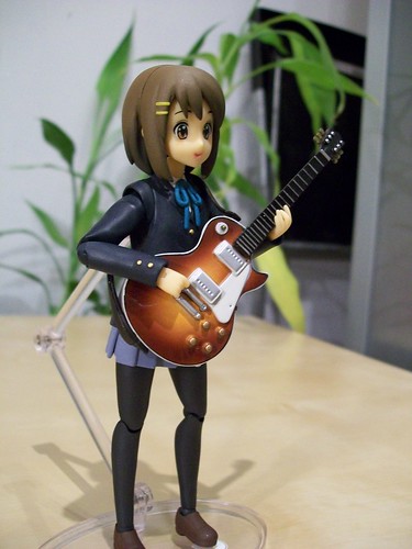 Yui with her guitar