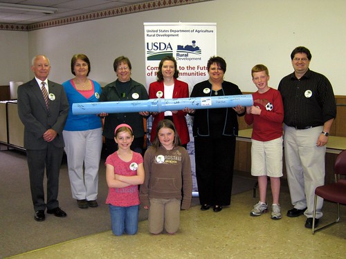 Water Pipe signed by State Senator Greg Adams, State Director Maxine Moul and staff, City Clerk and Associates,  Consulting Engineers, and Earth Day 4th grade poster contest winners from Cross County Community Schools.