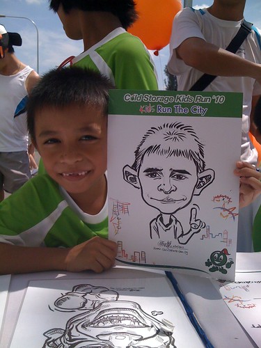 caricature live sketching for Cold Storage Kids Run 2010 - 23