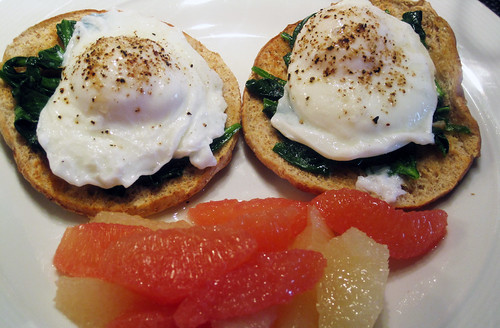 Poached Eggs Over Sauteed Garlic Spinach