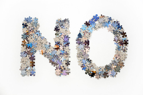 The word no made from jigsaw puzzle pieces