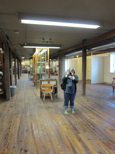 Marisa in an empty antique store