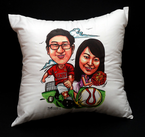 Couple caricatures - Man U soccer player + pong pong girl on cushion