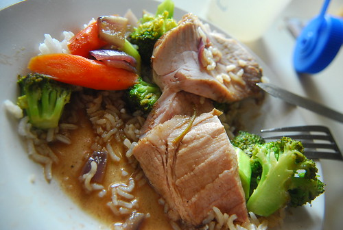 Roast pork on veggies and rice