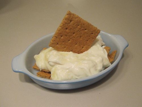 Top with lemon yogurt and another cracker