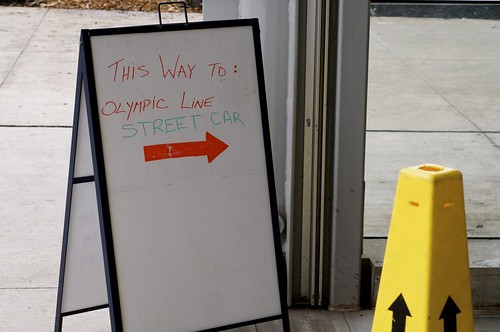 High-tech sign for Olympic Line at Olympic Village Station