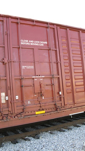 Door detail on a modern Norfolk Southern waffle sided Hi Cube box car. Chicago Illinois. Early April 2010.