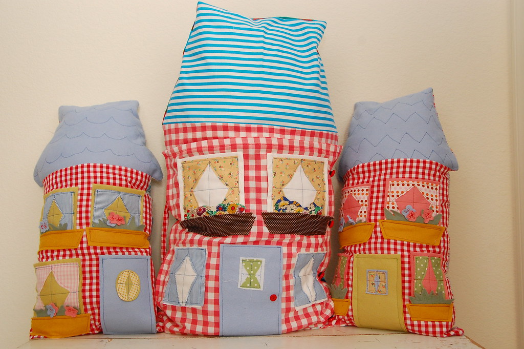 the three new dollhouse pillows