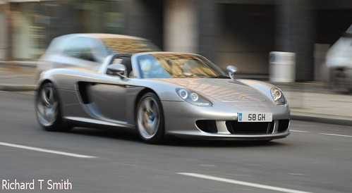 Carrera GT, driving past the back of The Lanesborough Hotel in London.