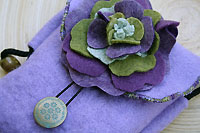magically Flowering wool felt purse by les petites choses