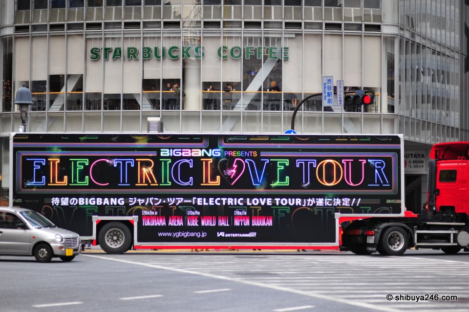 The Electric Love Tour advertising truck makes another pass through the crossing.