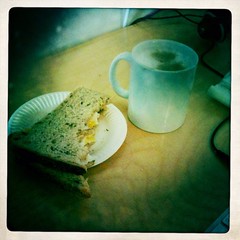 arty egg sandwich and latte