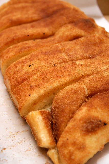 Cinnastix - soft, fluffy breadsticks sprinkled with cinnamon and icing sugar. Free when you order online!