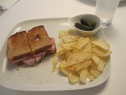 Ham sandwich, chips, pickles