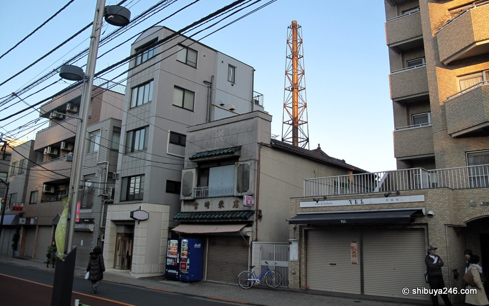 Looks like a public bath house or onsen tower here.
