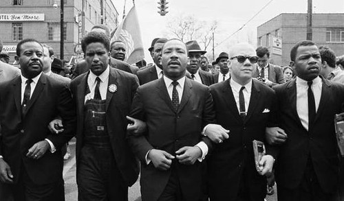 John Lewis; Jesse Douglas; Martin Luther King, Jr; James Forman; Ralph Abernathy, marching in Montgomery (by: Steve Schapiro, via history.com)