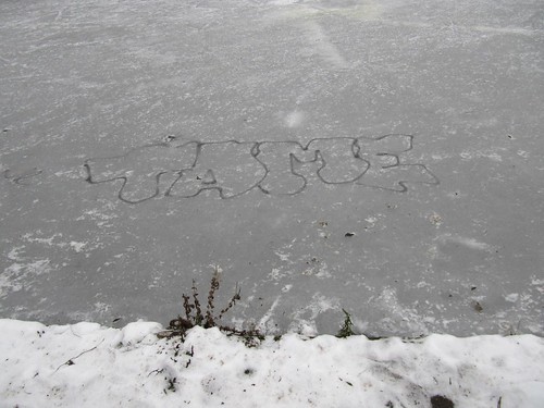 Graffito on icy canal 4448