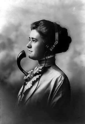 A telephone operator circa 1911.