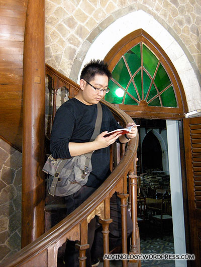 Reading on a spiral staircase