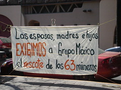 Grupo México protest banner