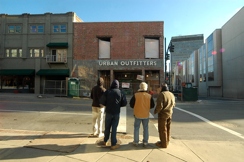 Checking their work on Urban Outfitters' new sign