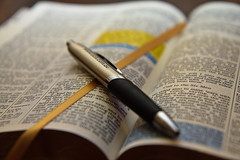 Open Bible with pen