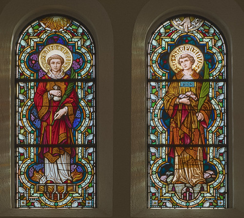 Saint Meinrad Archabbey, in Saint Meinrad, Indiana, USA - stained glass windows of the deacon-martyrs Saint Lawrence and Saint Stephen