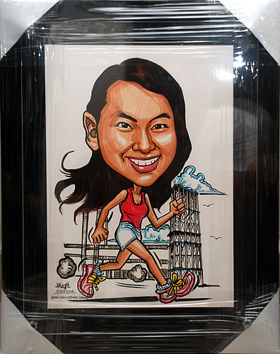 caricature running  with reactors setting in black acrylic frame backing