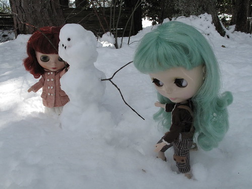 Gretel and Harmonee make a snowman together.