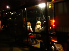 at a bus stop in London (by: Christian Guthier, creative commons license)