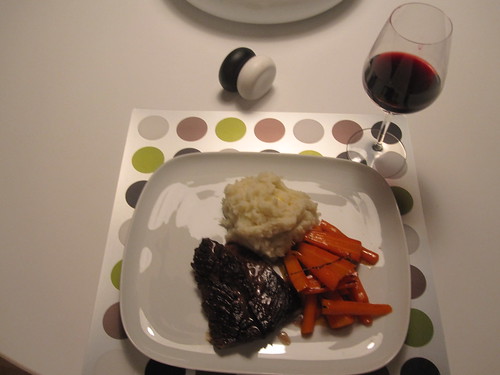 Steak, glazed carrots, mashed potatoes, wine