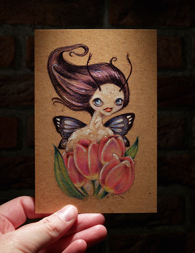 Postcard of Pixie with tulips