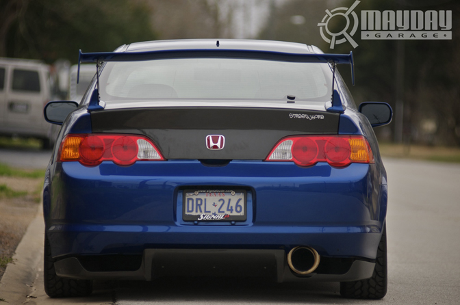 Carbon must be a recurring theme. Mugen wing, trunk, and diffuser get the CF treatment.