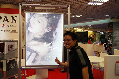 Me and a poster of a documentary about a pornographer