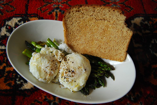 Poached eggs on roasted asparagus and toast
