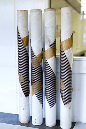 Chocolate stripes set into heavy tubes to create chocolate spirals