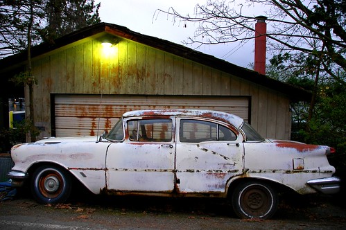 Oldsmobile, Rusty, white car, south side of the Montlake Cut, Seattle, Washington, USA by Wonderlane