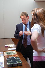 Ed Vaizey viewing Roman coins with Anna Booth