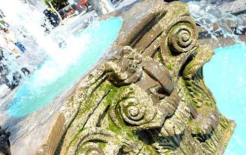 Mossy Corinthian capitol fountain in turquoise pool of water, Guadalajara, Jalisco, Mexico by Wonderlane