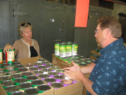 FNS Administrator Julie Paradis and Ron Rotzahn, Program Specialist, Helena, Montana Field Office, discuss food distribution challenges at the St. Ignatius Food Distribution center on the Flathead Reservation.