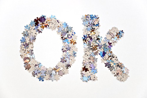 Word OK written using jigsaw puzzle pieces