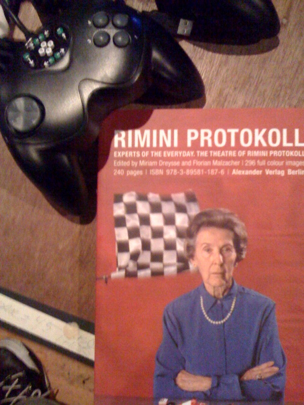 gamecontroller and book