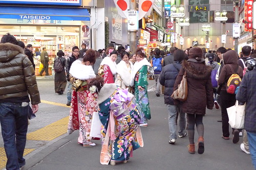 Kimono girls taking photos of each other in Shibuya